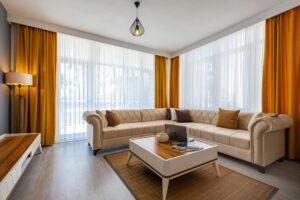 Stylish L-shaped sofa set in neutral color perfect for family living room